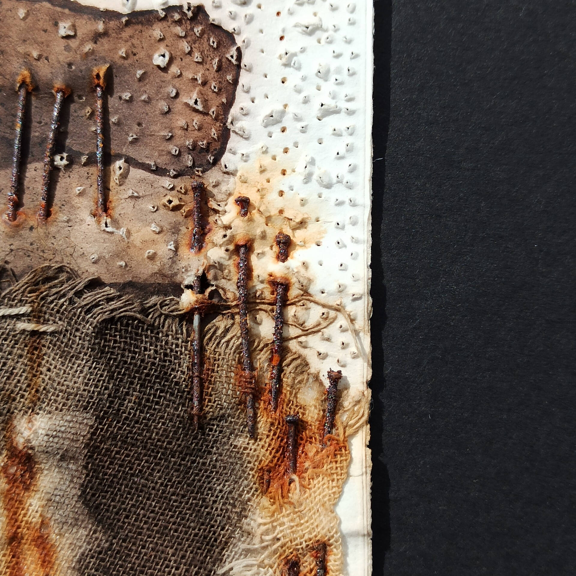 Abstract Image with Burlap Fabric and Rusted Nails